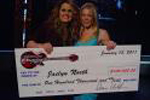 LeAnn Rimes hands Jaclyn North her check for $100,000.00 after wining 2010 Country Showdown Final and being named 